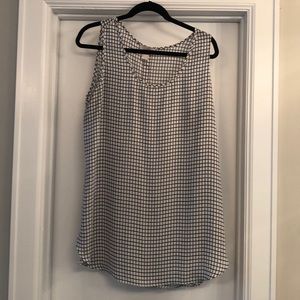 Black and white checkered sleeveless blouse